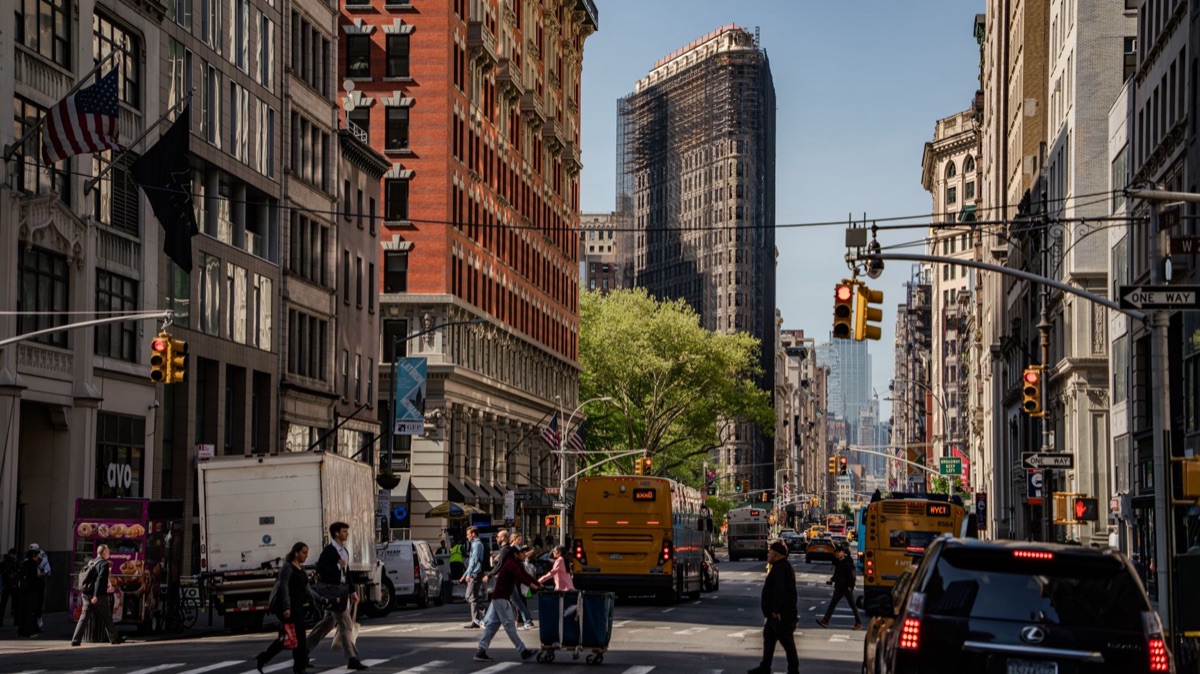 Tall building with pedestrians showing urban environment