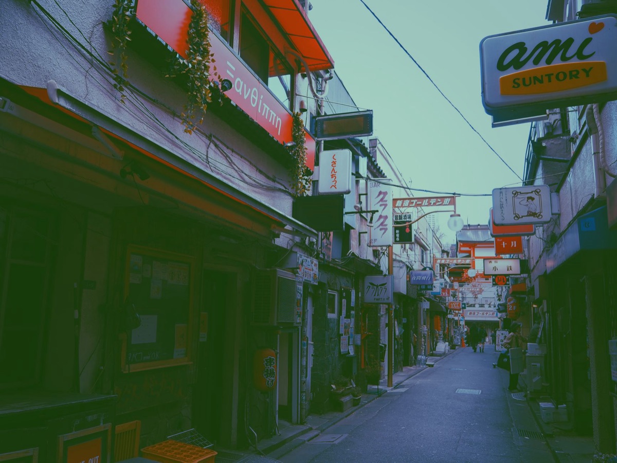 Local Tokyo: Street with Retro Shop Signs and Street Food Vendor