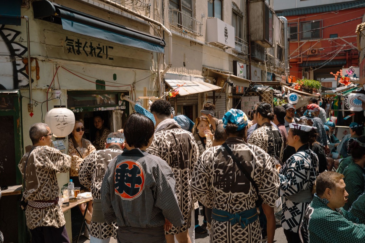 Local Tokyo resident in a kimono holding a tea cup