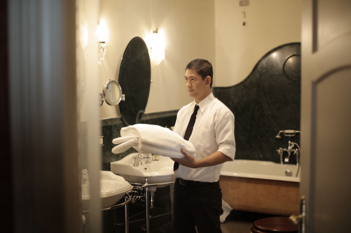 onsen attendant with towel