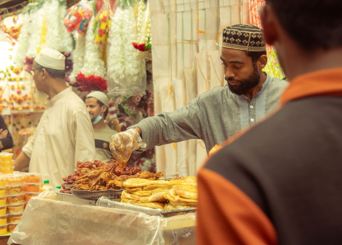Festival vendor stand with colorful food stalls